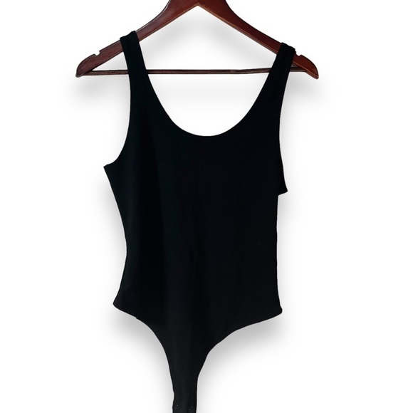 Jo & Co black one piece body suit snap closure and thong back size large - Picture 1 of 10